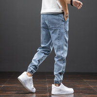 Wiosna lato czarne niebieskie dżinsy Cargo mężczyźni Streetwear Denim spodnie do biegania mężczyźni Baggy Harem Jean spodnie Plus rozmiar 6XL 7XL 8XL 3